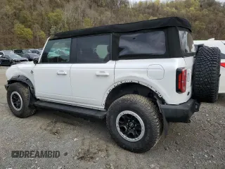 2024 Ford Bronco Outer Banks z VIN 1FMEE8BP1RLA50798, wystawiony jako Copart lot #54117355 z przebiegiem 8 182 mil mil oraz Szkoda całkowita • Salvage title. Historia ofert i sprzedaży dostępna na DreamBid. Obrazek 2.