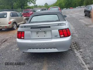 2002 Ford Mustang Deluxe z VIN 1FAFP44492F221578, wystawiony jako IAAI lot #42242232 z przebiegiem 107 773 mil mil oraz . Historia ofert i sprzedaży dostępna na DreamBid. Obrazek 17.
