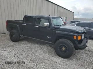 2009 Hummer H3 with VIN 5GNEN13L198138745, listed as a Copart auction lot 63202914 with 168,076 mi miles and Salvage Title. Bid and sale history available at DreamBid. Image 4.