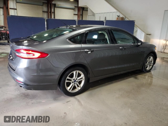 2018 Ford Fusion SE z VIN 3FA6P0H79JR111709, wystawiony jako Copart lot #52972855 z przebiegiem 116 442 mil mil oraz Czysty tytuł • Clean title. Historia ofert i sprzedaży dostępna na DreamBid. Obrazek 3.