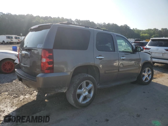 2011 Chevrolet Tahoe LS with VIN 1GNSCAE00BR395849, listed as a Copart auction lot 54750685 with 183,336 mi miles and Salvage title. Bid and sale history available at DreamBid. Image 3.