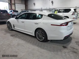 2018 Kia Stinger with VIN KNAE15LA6J6031821, listed as a IAAI auction lot 41871185 with 164,393 mi miles. Bid and sale history available at carsss.com. Image 3.