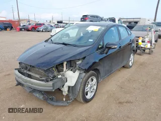 2018 Ford Fiesta SE z VIN 3FADP4BJ0JM139172, wystawiony jako IAAI lot #41212242 z przebiegiem 160 238 mil mil oraz . Historia ofert i sprzedaży dostępna na DreamBid. Obrazek 18.