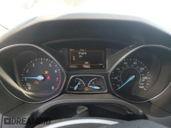 2017 Ford Focus SE z VIN 1FADP3F24HL316007, wystawiony jako Copart lot #56416645 z przebiegiem 79 085 mil mil oraz Szkoda całkowita • Salvage title. Historia ofert i sprzedaży dostępna na DreamBid. Obrazek 9.