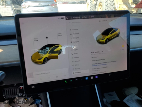 2019 Tesla Model 3 Mid Range with VIN 5YJ3E1EA5KF412702, listed as a Copart auction lot 50008895 with 134,178 mi miles and Salvage Title. Bid and sale history available at carsss.com. Image 9.