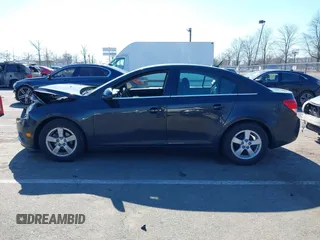 2014 Chevrolet Cruze 1LT with VIN 1G1PC5SB5E7482067, listed as a IAAI auction lot 41697625 with 51,036 mi miles and . Bid and sale history available at DreamBid. Image 14.