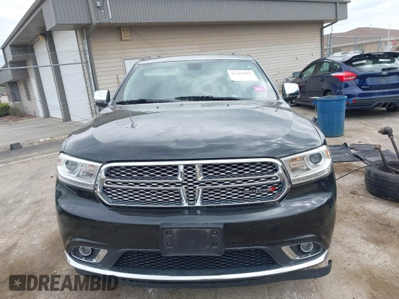 2014 Dodge Durango Citadel with VIN 1C4RDJEGXEC524883, listed as a IAAI auction lot 42357919 with 205,100 mi miles and . Bid and sale history available at DreamBid. Image 13.