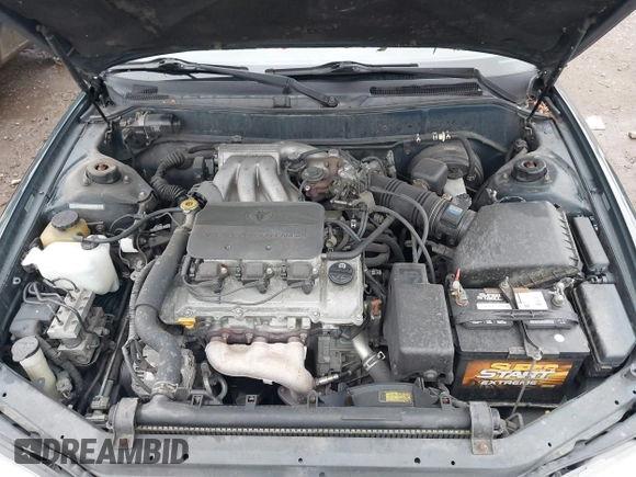 1996 Toyota Camry LE z VIN 4T1EF12K9TU116427, wystawiony jako IAAI lot #38696498 z przebiegiem 242 599 mil mil oraz . Historia ofert i sprzedaży dostępna na DreamBid. Obrazek 10.