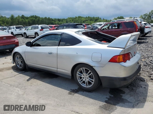2002 Acura RSX Auto with VIN JH4DC54882C011723, listed as a Copart auction lot 64187865 with 106,692 mi miles and Clean title. Bid and sale history available at DreamBid. Image 2.