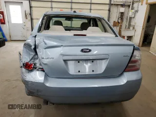 2008 Ford Taurus SEL with VIN 1FAHP24W38G130517, listed as a Copart auction lot 53086395 with 128,777 mi miles and Salvage Title. Bid and sale history available at carsss.com. Image 6.