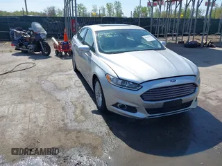 2016 Ford Fusion Energi SE Luxury with VIN 3FA6P0PU8GR273122, listed as a IAAI auction lot 42062083 with 166,318 mi miles. Bid and sale history available at carsss.com. Image 1.