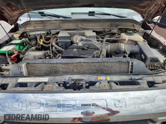 2012 Ford F-250 XL with VIN 1FT7W2B60CEC09675, listed as a Copart auction lot 62541985 with 144,961 mi miles and Salvage title. Bid and sale history available at DreamBid. Image 11.