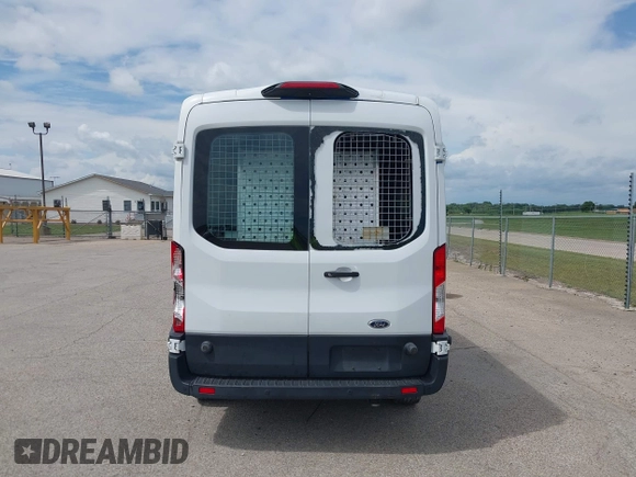 2019 Ford Transit z VIN 1FTYE2CM2KKB42436, wystawiony jako IAAI lot #42636612 z przebiegiem 51 860 mil mil oraz . Historia ofert i sprzedaży dostępna na DreamBid. Obrazek 17.