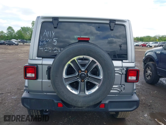 2019 Jeep Wrangler Unlimited Sahara with VIN 1C4HJXEN5KW542403, listed as a IAAI auction lot 42159197 with 60,378 mi miles and . Bid and sale history available at DreamBid. Image 16.