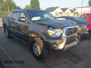 2015 Toyota Tacoma PreRunner with VIN 5TFJU4GN1FX065621, listed as a IAAI auction lot 42268229 with 137,800 mi miles and . Bid and sale history available at DreamBid. Image 1.
