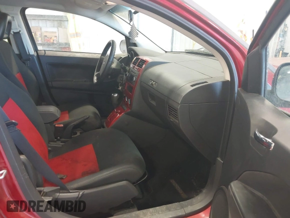 2009 Dodge Caliber SXT with VIN 1B3HB48A79D108706, listed as a IAAI auction lot 41555213 with 159,577 mi miles and . Bid and sale history available at DreamBid. Image 5.