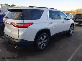 2021 Chevrolet Traverse LT Leather with VIN 1GNERHKW5MJ174570, listed as a IAAI auction lot 41250400 with 80,689 mi miles. Bid and sale history available at carsss.com. Image 4.
