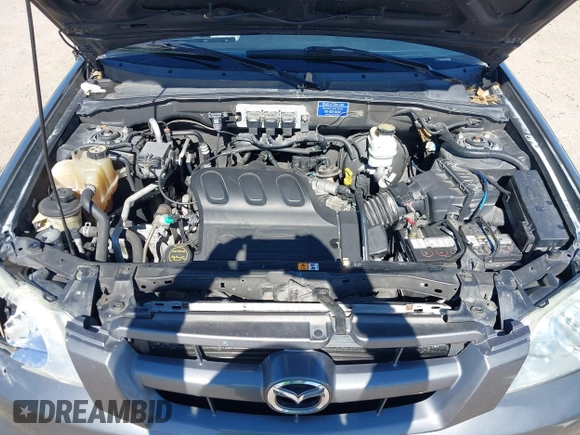 2005 Mazda Tribute S with VIN 4F2CZ06175KM49643, listed as a IAAI auction lot 41397843 with 185,088 mi miles and . Bid and sale history available at carsss.com. Image 10.