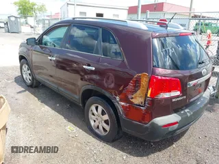 2011 Kia Sorento LX with VIN 5XYKT4A13BG044196, listed as a IAAI auction lot 42080972 with 292,004 mi miles. Bid and sale history available at carsss.com. Image 3.