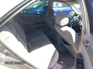 2005 Toyota Camry STD z VIN 4T1BE32K95U556765, wystawiony jako IAAI lot #42288424 z przebiegiem 232 413 mil mil oraz . Historia ofert i sprzedaży dostępna na DreamBid. Obrazek 8.