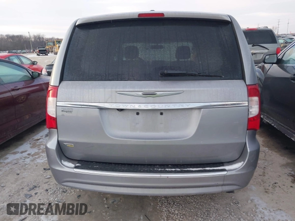 2014 Chrysler Town & Country Touring z VIN 2C4RC1BG2ER131605, wystawiony jako IAAI lot #41406423 z przebiegiem 167 567 mil mil oraz . Historia ofert i sprzedaży dostępna na DreamBid. Obrazek 16.