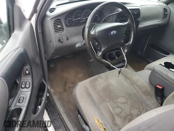 2002 Ford Ranger XL Fleet with VIN 1FTYR44U82TA21001, listed as a Copart auction lot 58392305 with 234,824 mi miles and Salvage title. Bid and sale history available at DreamBid. Image 8.