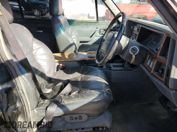 1996 Jeep Cherokee z VIN 1J4FN78S8TL160974, wystawiony jako Copart lot #83425604 z przebiegiem 336 313 mil mil oraz Szkoda całkowita • Salvage title. Historia ofert i sprzedaży dostępna na DreamBid. Obrazek 7.