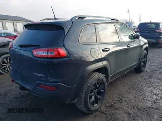 2017 Jeep Cherokee Trailhawk with VIN 1C4PJMBS4HW647852, listed as a IAAI auction lot 41192324 with 116,429 mi miles and . Bid and sale history available at DreamBid. Image 4.