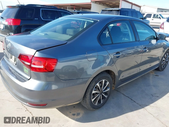 2015 Volkswagen Jetta S with VIN 3VW2K7AJXFM282623, listed as a IAAI auction lot 42336468 with 95,157 mi miles and . Bid and sale history available at DreamBid. Image 4.