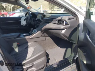 2023 Toyota Camry SE with VIN 4T1T11AK8PU138805, listed as a IAAI auction lot 41977827 with 19,661 mi miles and . Bid and sale history available at DreamBid. Image 5.