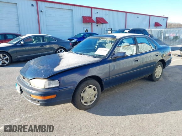 1994 Toyota Camry LE with VIN 4T1SK12EXRU374215, listed as a IAAI auction lot 41581093 with 80,397 mi miles. Bid and sale history available at carsss.com. Image 2.