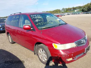 2004 Honda Odyssey EX-L with VIN 5FNRL18004B005876, listed as a IAAI auction lot 40566452 with 196,274 mi miles and . Bid and sale history available at DreamBid. Image 1.