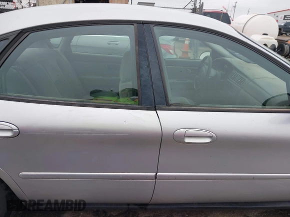 2006 Ford Taurus SE z VIN 1FAFP53U26A234490, wystawiony jako IAAI lot #42125983 z przebiegiem 173 686 mil mil oraz . Historia ofert i sprzedaży dostępna na DreamBid. Obrazek 14.
