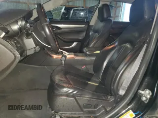2009 Cadillac CTS RWD с VIN 1G6DF577590169740, выставлен на аукционе Copart как лот 57041055 с пробегом 68 857 миль миль и Списание • Salvage title. История ставок и продаж доступна на DreamBid. Изображение 7.