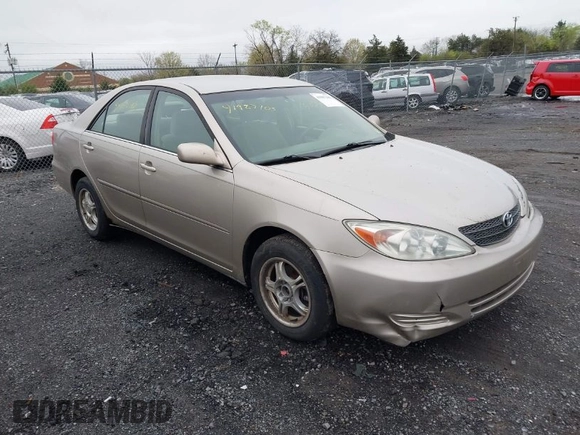 2004 Toyota Camry LE with VIN 4T1BE30KX4U327013, listed as a IAAI auction lot 41987105 with 241,236 mi miles. Bid and sale history available at carsss.com. Image 1.