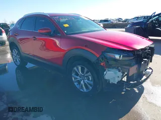2023 Mazda CX-30 S Preferred z VIN 3MVDMBCM7PM548552, wystawiony jako IAAI lot #41202219 z przebiegiem 12 303 mil mil oraz . Historia ofert i sprzedaży dostępna na DreamBid. Obrazek 1.