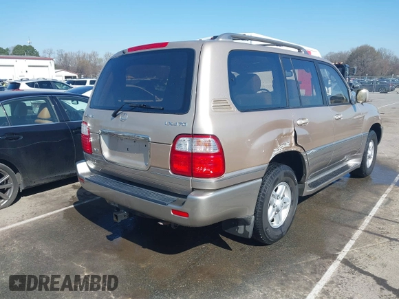 2000 Lexus LX 470 with VIN JT6HT00W8Y0118377, listed as a IAAI auction lot 41787649 with 230,442 mi miles and . Bid and sale history available at carsss.com. Image 4.