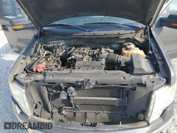 2011 Ford F-150 XL z VIN 1FTEX1CM3BFB94688, wystawiony jako Copart lot #61172765 z przebiegiem 197 227 mil mil oraz Szkoda całkowita • Salvage title. Historia ofert i sprzedaży dostępna na DreamBid. Obrazek 11.