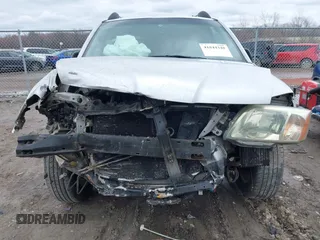 2005 Mitsubishi Endeavor LS with VIN 4A4MM21S65E020791, listed as a IAAI auction lot 41844348 with 208,007 mi miles. Bid and sale history available at carsss.com. Image 13.