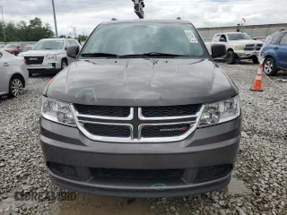 2017 Dodge Journey SE z VIN 3C4PDCAB1HT709104, wystawiony jako Copart lot #57132935 z przebiegiem 89 024 mil mil oraz Szkoda całkowita • Salvage title. Historia ofert i sprzedaży dostępna na DreamBid. Obrazek 5.