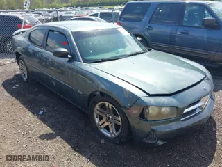 2006 Dodge Charger with VIN 2B3KA43G46H160619, listed as a IAAI auction lot 42014059 with 202,795 mi miles. Bid and sale history available at carsss.com. Image 1.