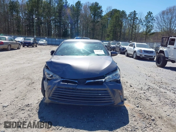 2015 Toyota Camry XLE z VIN 4T1BF1FK5FU092709, wystawiony jako IAAI lot #41859995 z przebiegiem 167 819 mil mil oraz . Historia ofert i sprzedaży dostępna na DreamBid. Obrazek 11.