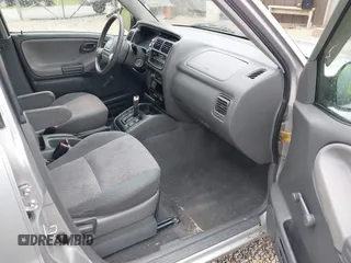 2004 Chevrolet Tracker z VIN 2CNBE134X46916014, wystawiony jako IAAI lot #42219723 z przebiegiem 206 172 mil mil oraz . Historia ofert i sprzedaży dostępna na DreamBid. Obrazek 5.
