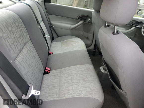 2005 Ford Focus S with VIN 1FAFP34N55W115653, listed as a Copart auction lot 63043315 with 110,593 mi miles and Salvage title. Bid and sale history available at DreamBid. Image 10.