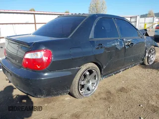 2005 Subaru Impreza Sedan (Natl) WRX with VIN JF1GD29605G515722, listed as a IAAI auction lot 42030403 with 213,788 mi miles. Bid and sale history available at carsss.com. Image 4.