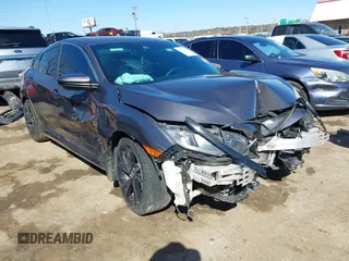 2019 Honda Civic Sedan Sport with VIN 19XFC2F82KE019704, listed as a IAAI auction lot 41770051 with 90,011 mi miles. Bid and sale history available at carsss.com. Image 1.