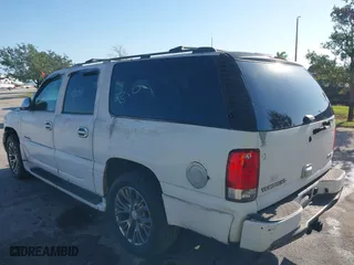 2006 GMC Yukon XL Denali with VIN 1GKFK66U56J142191, listed as a IAAI auction lot 41862921 with 147,655 mi miles. Bid and sale history available at carsss.com. Image 3.