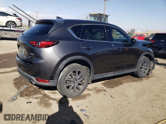 2018 Mazda CX-5 Grand Touring with VIN JM3KFADMXJ1323646, listed as a Copart auction lot 46857825 with 62,262 mi miles and Salvage title. Bid and sale history available at DreamBid. Image 3.