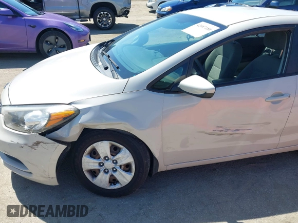 2014 Kia Forte LX with VIN KNAFK4A63E5115830, listed as a IAAI auction lot 42087188 with 111,660 mi miles. Bid and sale history available at carsss.com. Image 12.