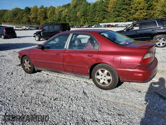 1996 Honda Accord EX with VIN 1HGCD5667TA021809, listed as a Copart auction lot 69371974 with 409,852 mi miles and Salvage Title. Bid and sale history available at carsss.com. Image 2.